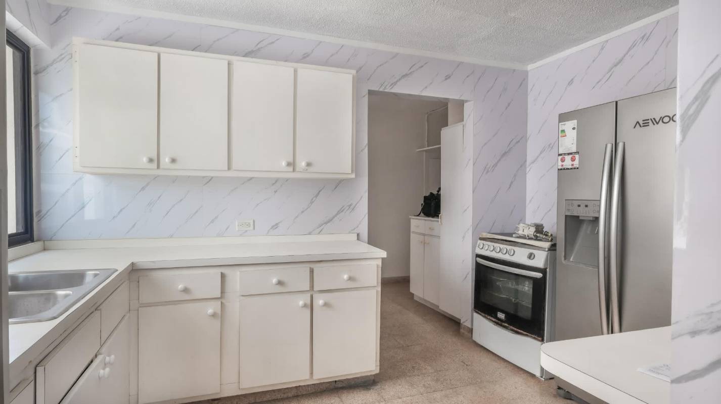 Kitchen with modern cabinets and appliances in PH Las Marianas Punta Paitilla Panama