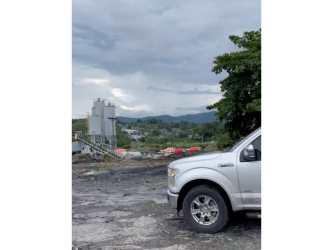 Large open gravel land fenced suitable for warehouses or storage area