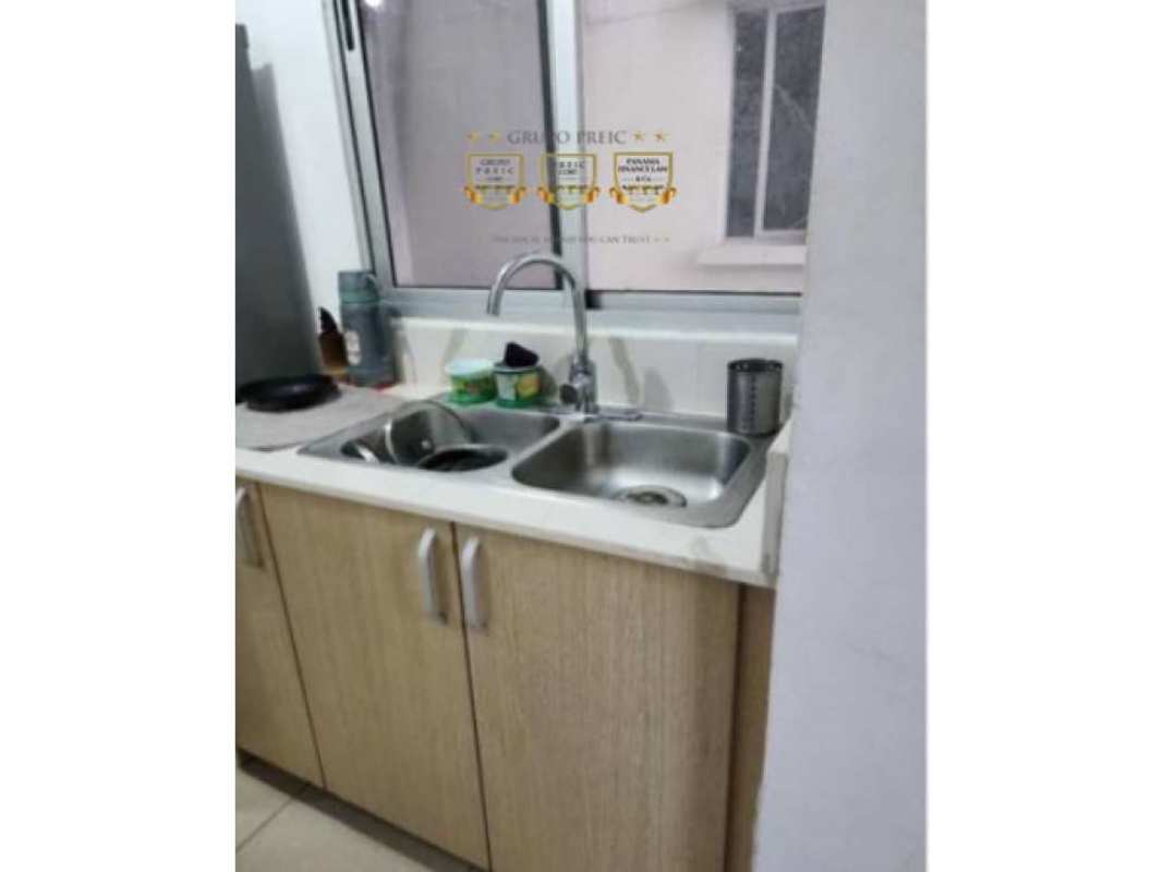 Outdoor swimming pool with lounge area and children playground in PH Rokas Condado del Rey Panama