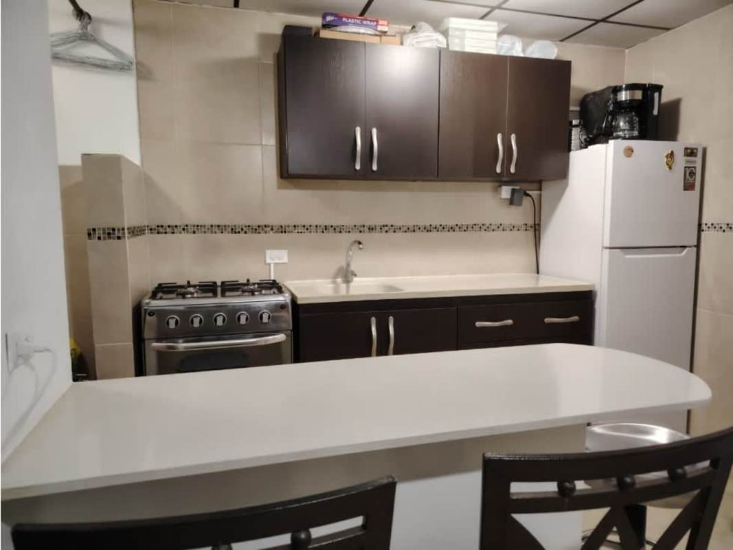 Bathroom with pedestal sink, zebra seat cover toilet, glass shower PH Beverly Plaza Panama