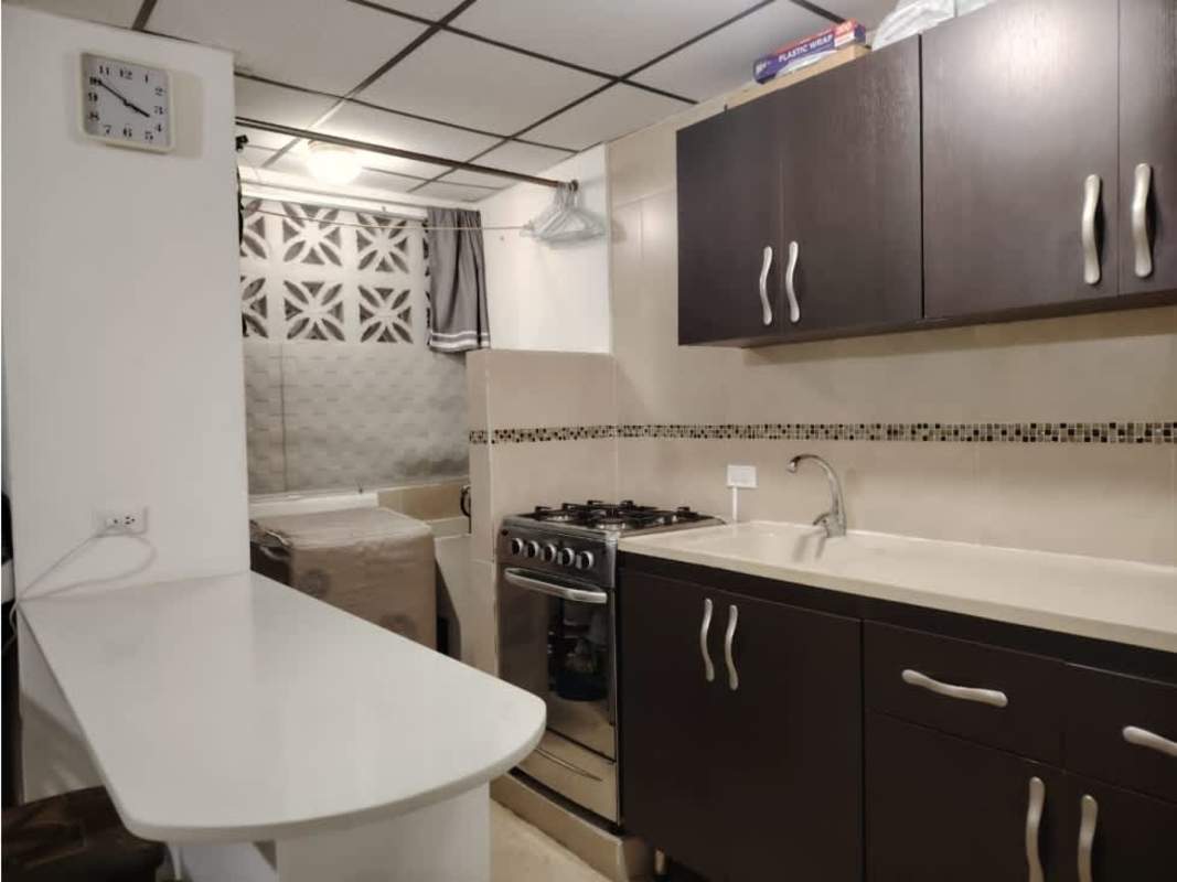 Compact modern kitchen with stove, fridge, mosaic tile, breakfast bar PH Beverly Plaza Panama