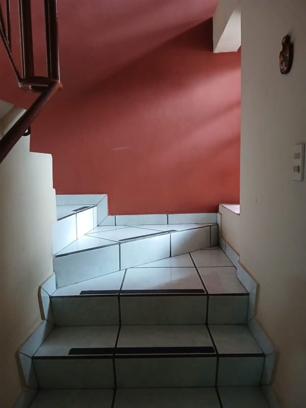 Compact bathroom with glass shower and white ceramic tiles Condado del Rey Panama