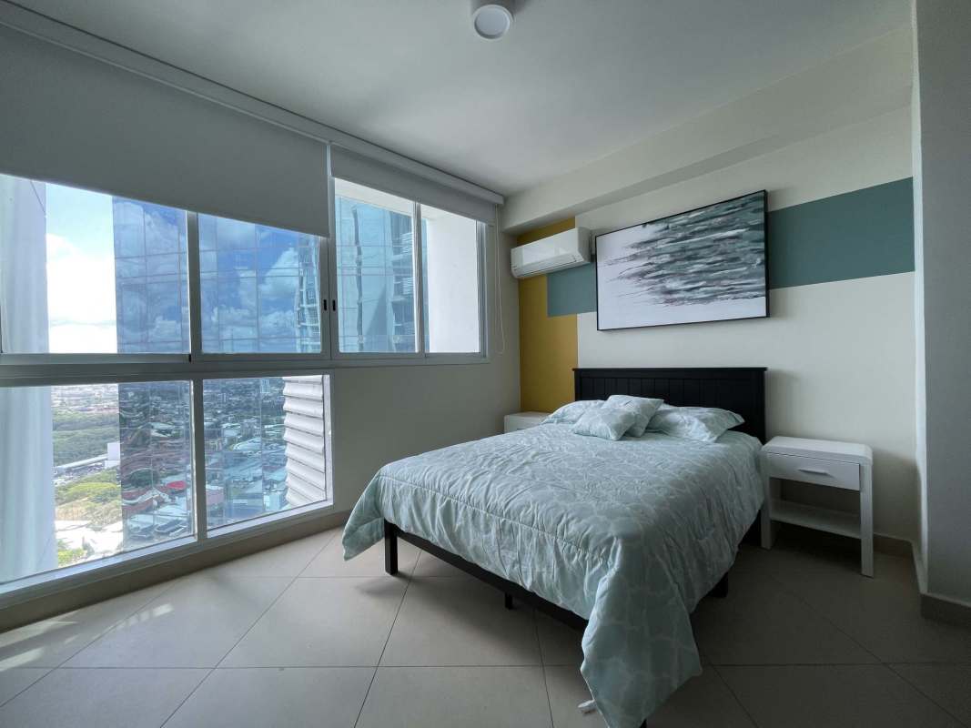 Modern bathroom with dual sinks, large mirror in PH Country Club Costa del Este Panama