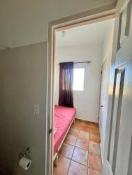 Spacious open plan dining and living room with AC furnished Sandpiper Punta Chame Panama