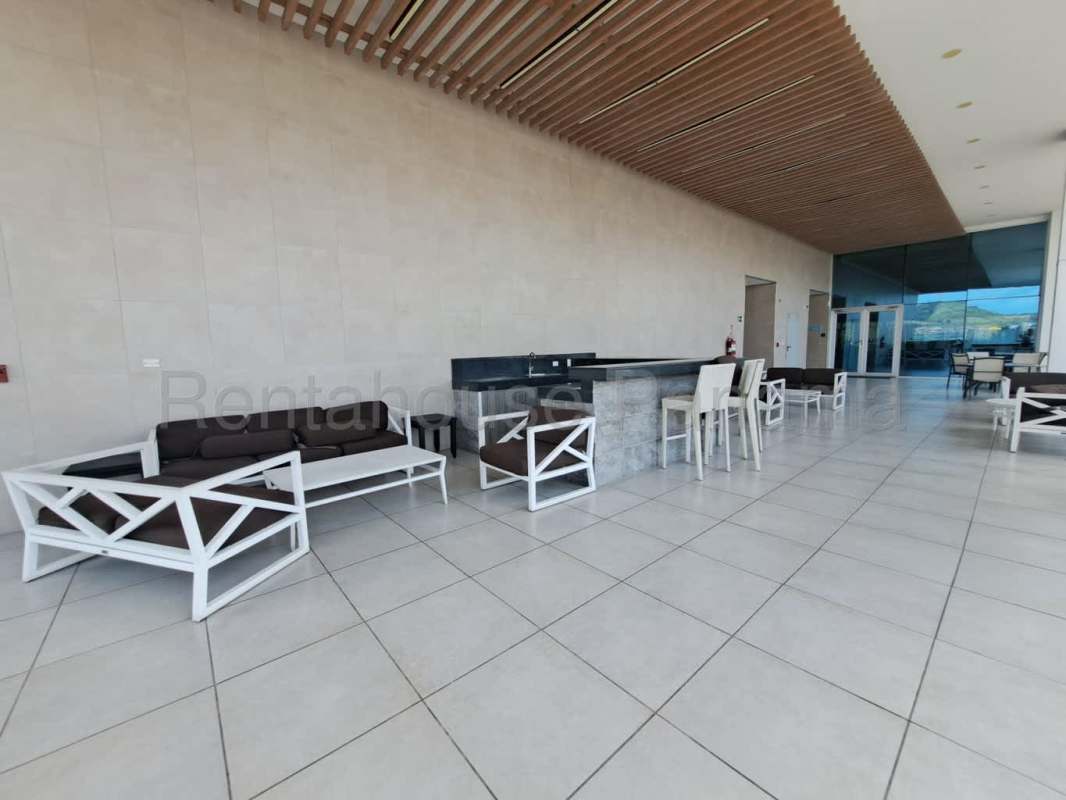Modern communal lounge and event space with natural light PH Villa de las Fuentes Betania