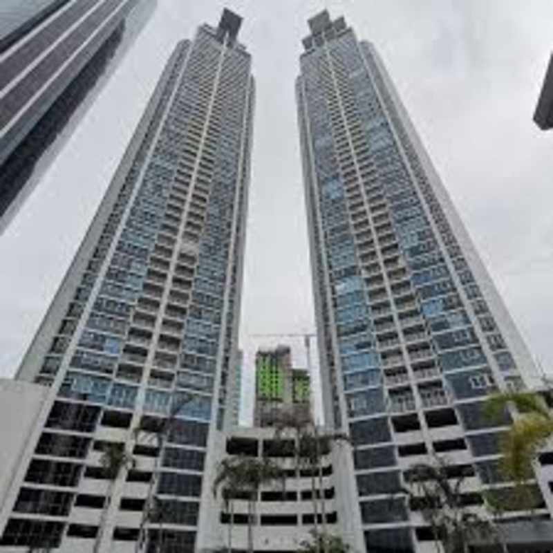 Modern glass facade of twin high-rise residential towers PH Country Club Costa del Este Panama