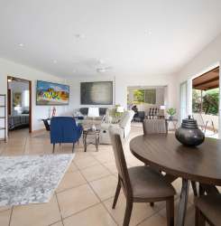 Furnished kitchen with appliances, wood cabinets, granite counters in Boquete Highlands condo for rent