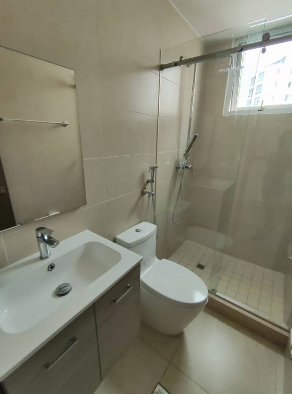 Contemporary bathroom with glass enclosed shower mosaic accent in PH Lumiere Panama