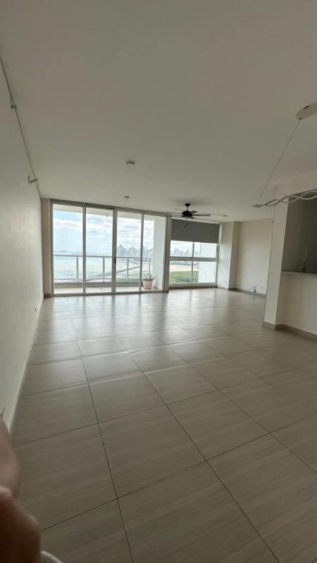 Master bedroom with panoramic ocean view and large windows in PH Asia Costa del Este Panama