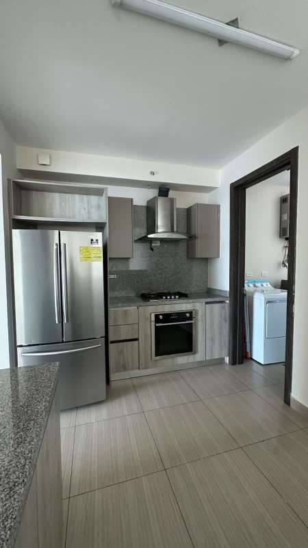 Bright spacious living room with floor-to-ceiling windows and seaview from PH Asia Costa del Este Panama