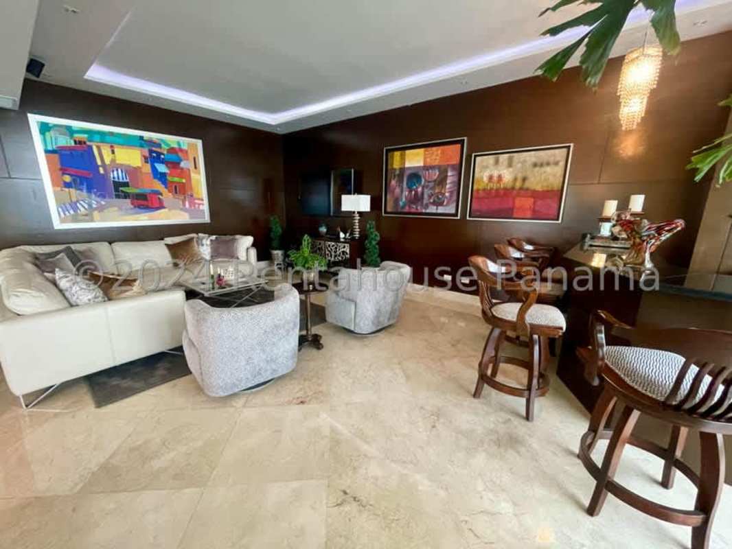 Luxury marble bathroom with separate tub, glass shower and ocean views in PH The Point Panama