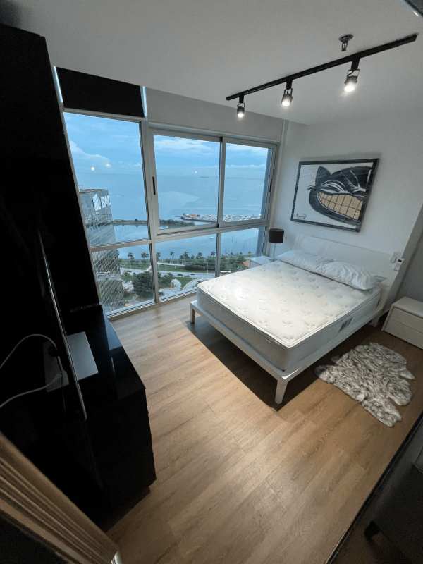 Open kitchen with granite island and view to living area PH Colores de Bella Vista Avenida Balboa Panama