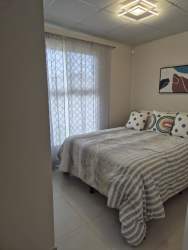 Bedroom in new Playa Dorada house bright with windows Bay Side Panama