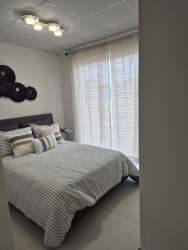 Bathroom with walk-in shower ceramic tile Bay Side Playa Dorada Panama