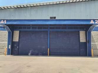 View of loading dock bays with roll-up doors in an industrial warehouse Costa Verde Arraiján Panama
