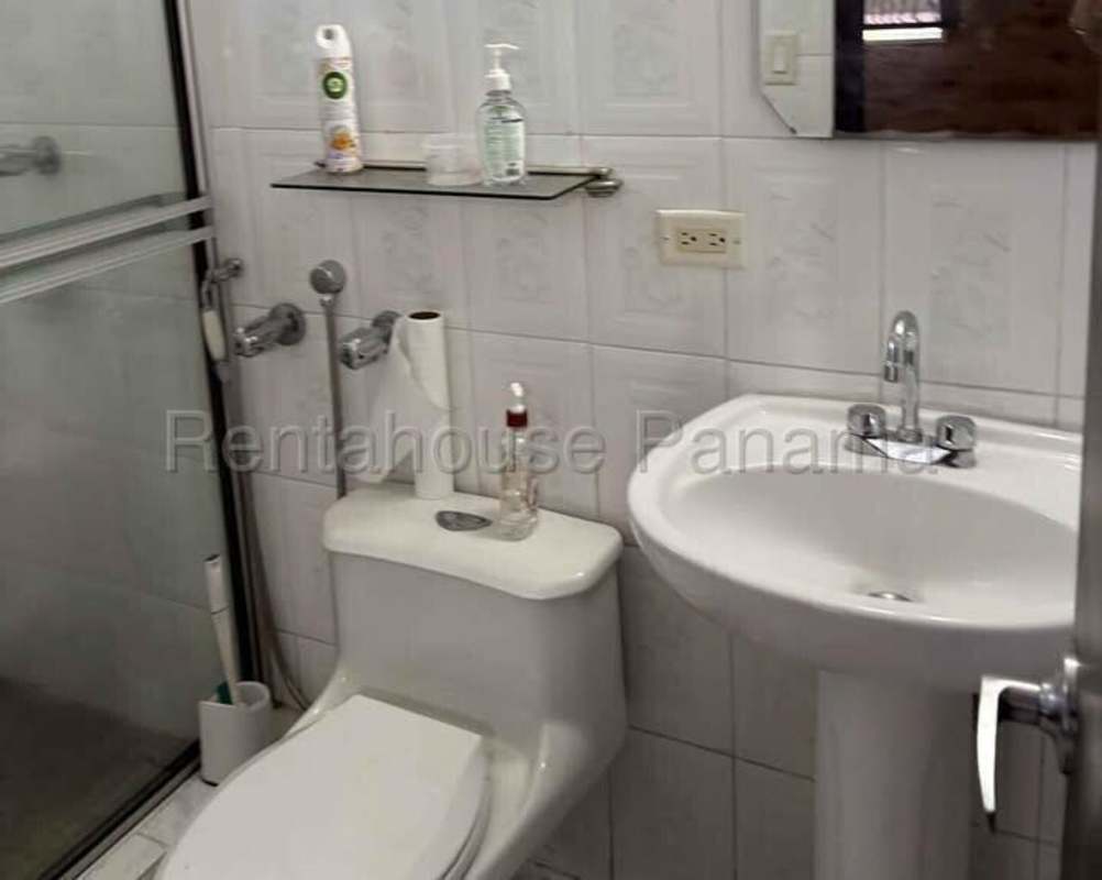 Bathroom with glass shower enclosure, sink, tiled walls PH Plaza Dos Mares Betania Panama