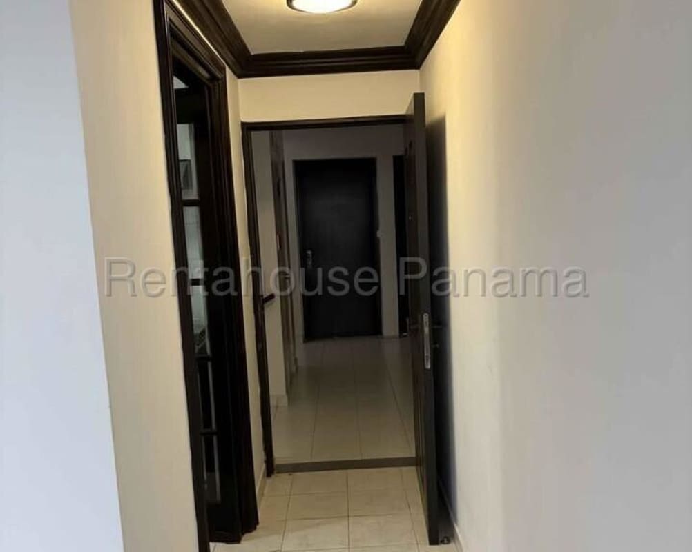 Bedroom featuring fan installation space, tile floor, large windows in Betania Panama