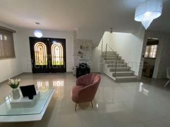 Contemporary bathroom with walk-in glass shower and modern sink vanity house for rent in Panama