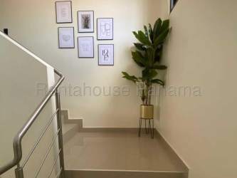 Minimalist staircase with modern railing in rental house La Chorrera Panama