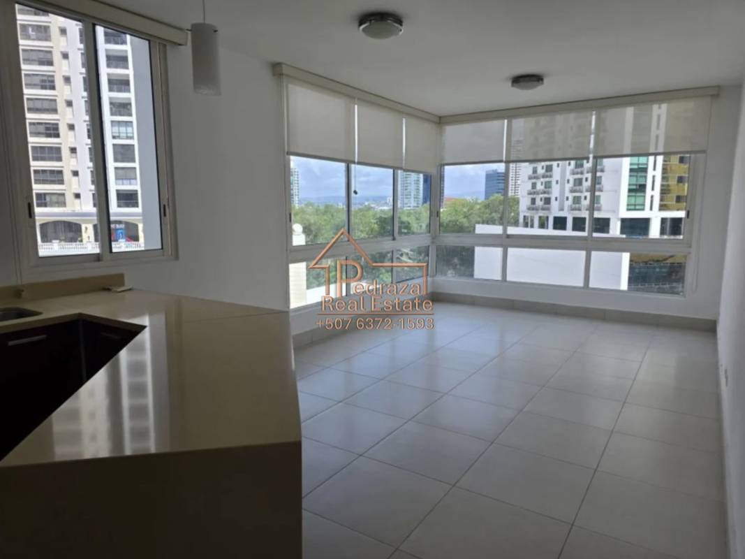 Bright living room open kitchen balcony tile floors PH Castellamare Costa del Este Panama City