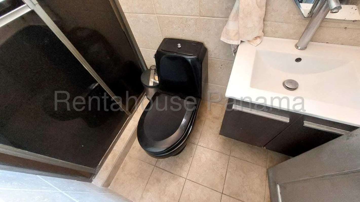 Modern bathroom with glass vessel sink, shower and decorative tiles Condado del Rey Panama