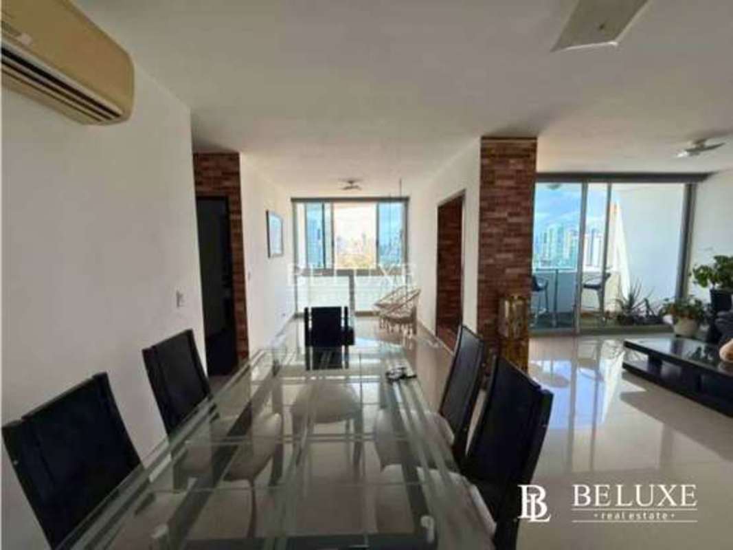 Fully equipped modern kitchen with granite countertops, tile backsplash, stainless appliances in Infinity Tower San Francisco