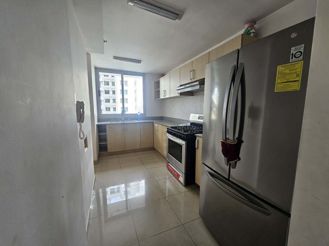 Bright open-concept living and dining room with balcony in furnished apartment PH Rokas Condado del Rey Panama