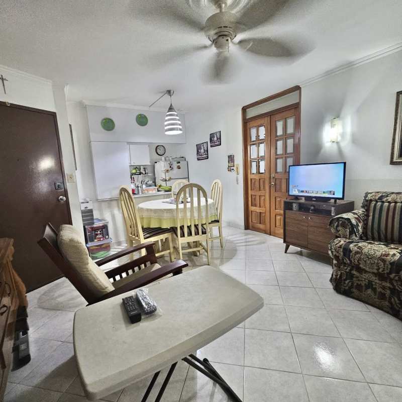 Traditional bathroom with bathtub, patterned curtain, white vanity in PH Brisas de España Carrasquilla Panama City