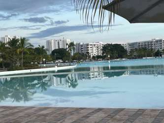 View towards lagoon pool and Playa Blanca Resort amenities from Villa Azul apartment