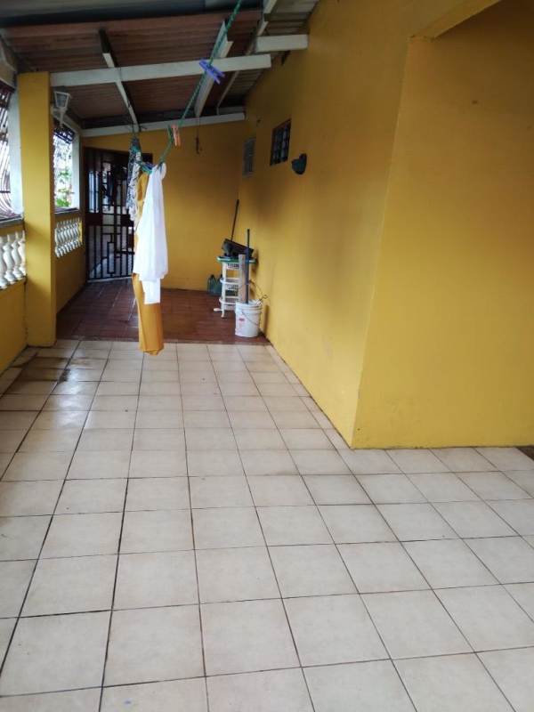 Back enclosed patio with utility sink and tiled floor Posada del Roble Panama