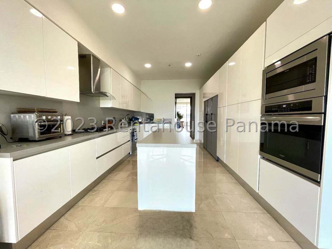 Spacious master suite with floor-to-ceiling windows, golf views, walk-in closet at PH The Lake Santa Maria