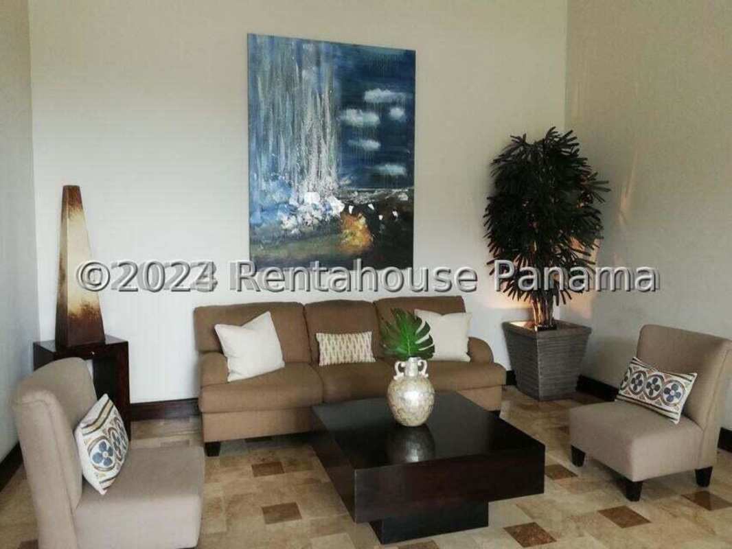 Modern bathroom with glass shower, tile walls, vanity and large mirror in PH Baleares Panama