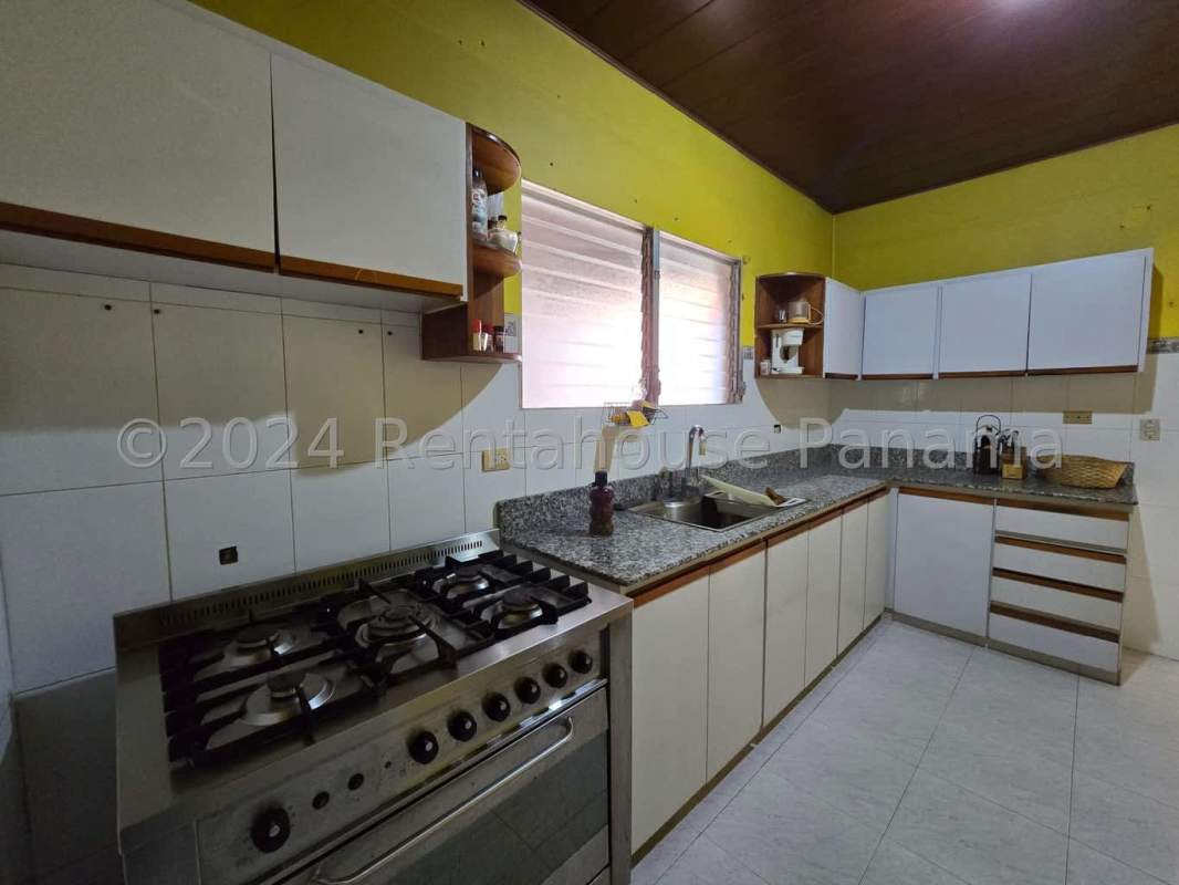 Bright dining room vaulted ceiling large windows Brisas del Golf Panama