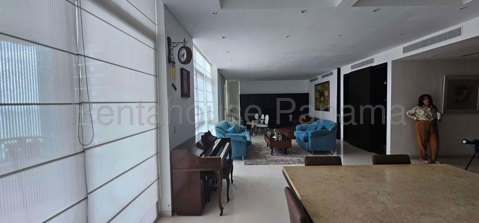 Modern dining room with panoramic windows and elegant finishes in Punta Pacifica apartment rental