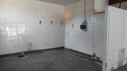 Multi-tenant commercial plaza exterior with Domino's Pizza and parking Panama Oeste