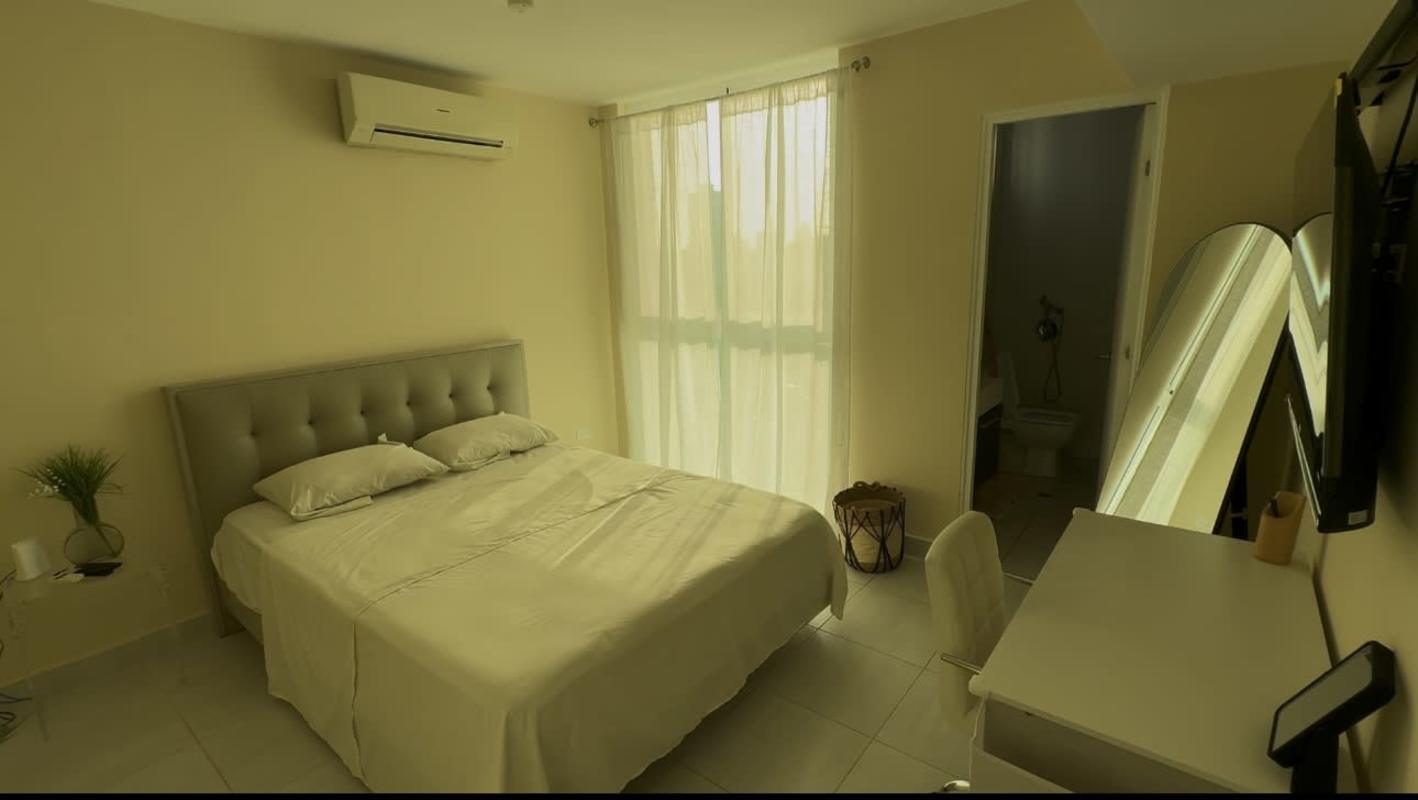 Second bedroom with ensuite bath, AC, large window in PH Carrasquilla Tower Panama City