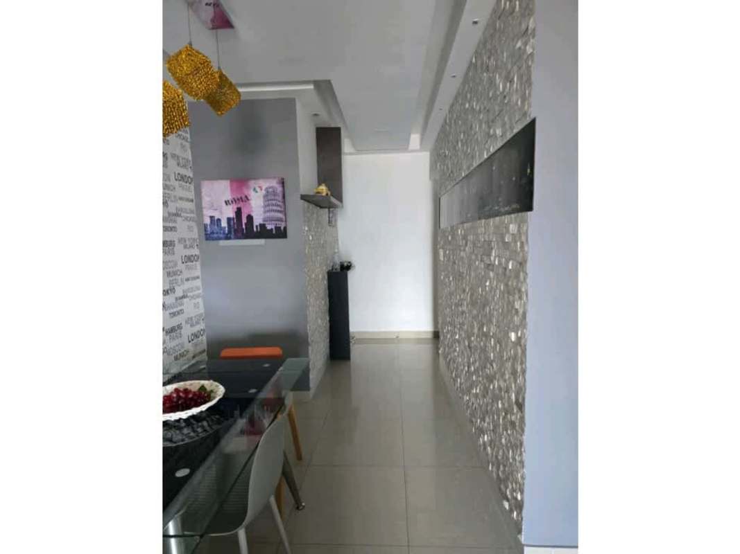 Dining space with cityname wallpaper glass table pendant lighting in PH Diamond Panama