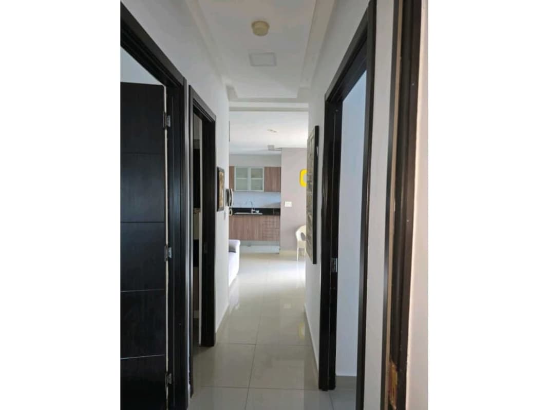 Minimalist hallway view leading toward kitchen and living room in PH Diamond Panama