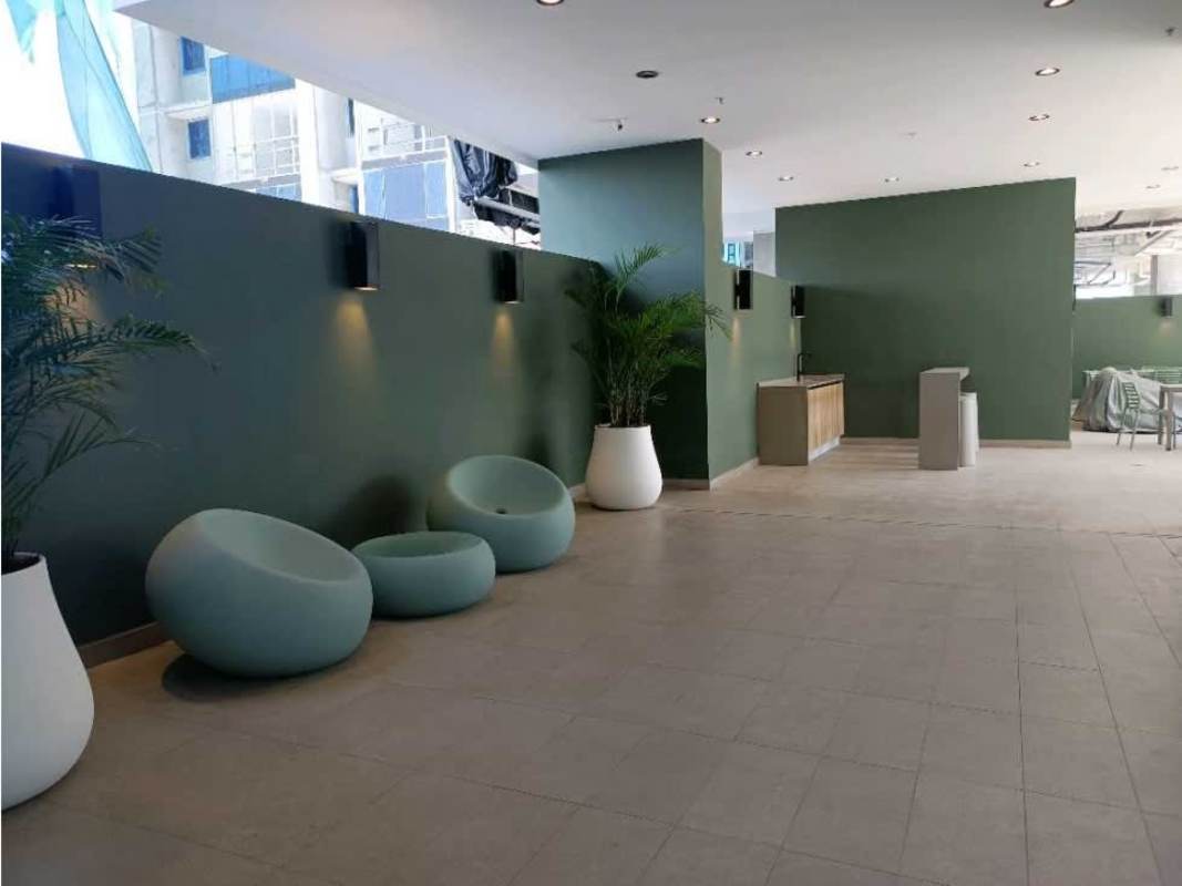 Indoor game room with pool table and city views at PH Square Park in Panama City