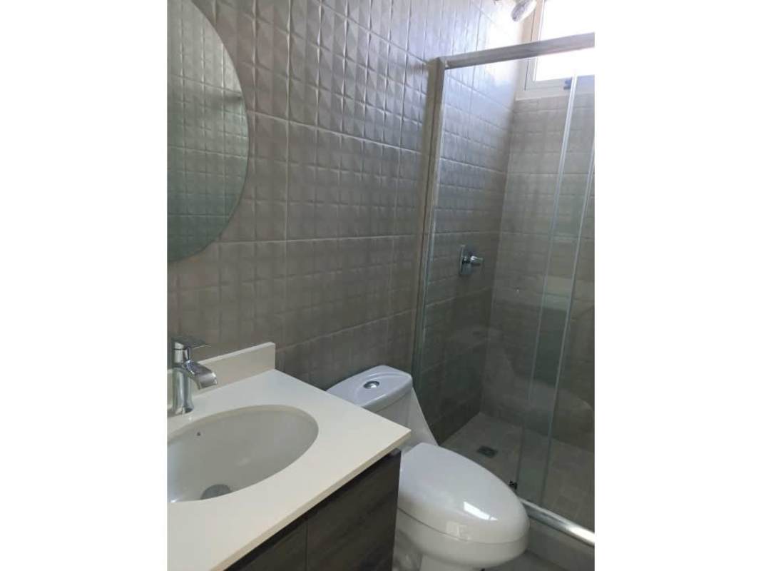 Stylish bathroom with shower and vanity PH Square Park Panama City rental