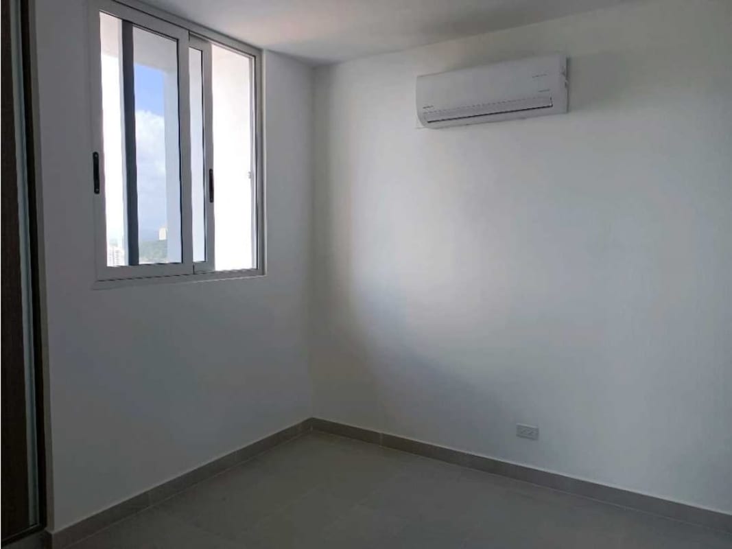 Bright contemporary lobby with green accent walls at PH Square Park Vía España Panama