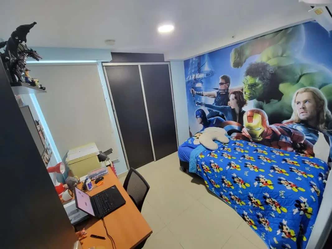 Colorful child's bedroom with superhero mural PH Coral Towers Carrasquilla Panama