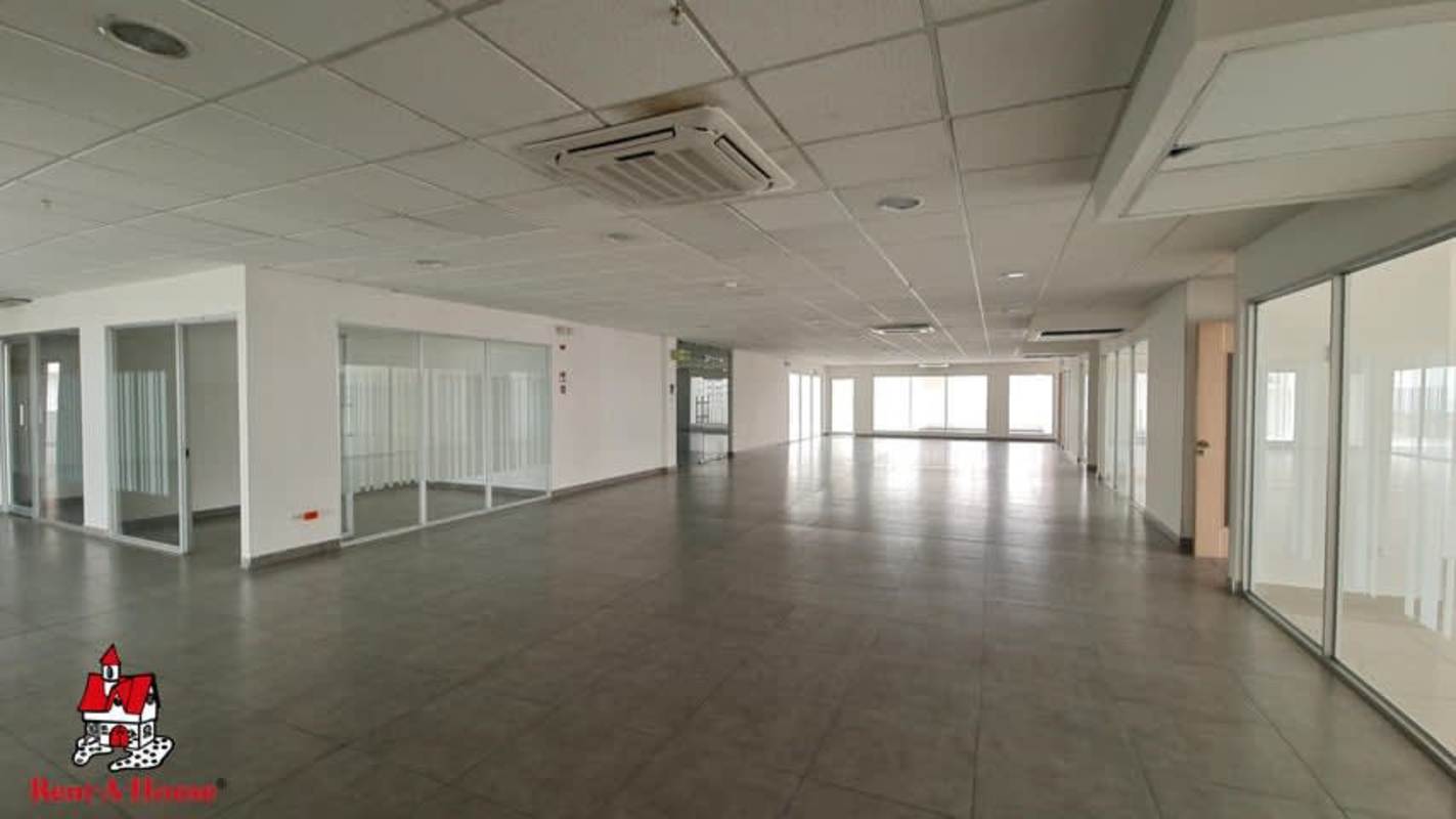 Panoramic commercial office with recessed lights and large windows in PH Business Tower Panama City