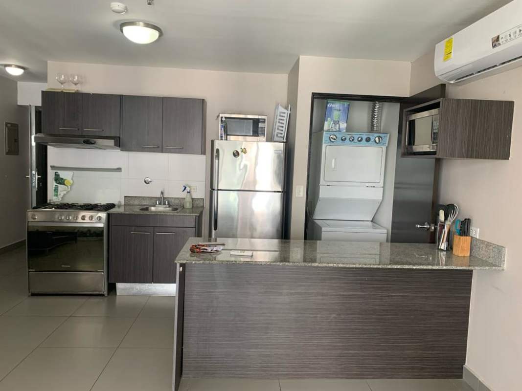 Fully equipped modern kitchen with granite countertop, stainless appliances, washer dryer in PH De Colores, Panama City