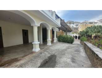 Mediterranean architecture exterior townhouse with balconies at Tucán Country Club Panama Pacifico