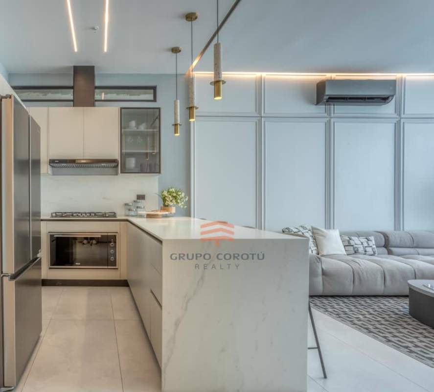 Elegant living and dining room open plan with city views in PH Punta Paitilla