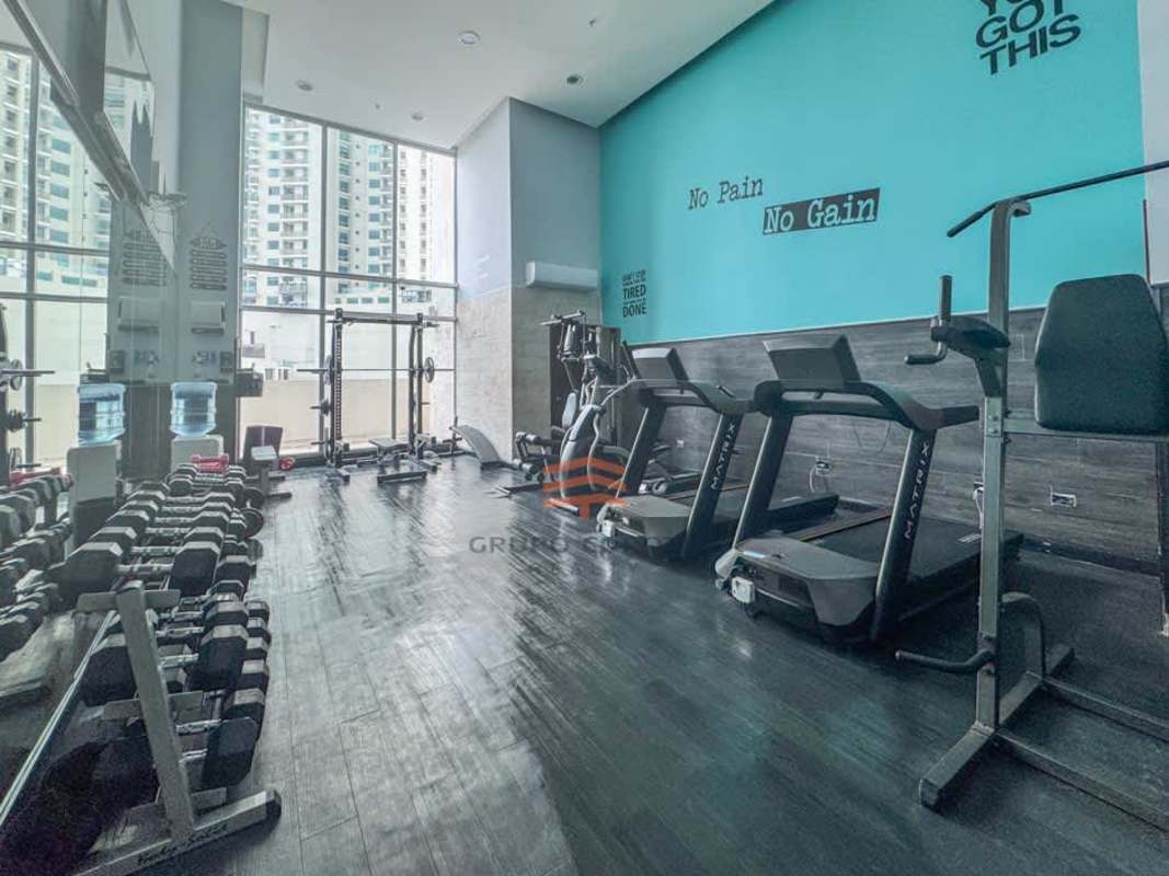 Oceanfront infinity pool with lounge chairs at PH Dupont luxury tower Punta Pacifica Panama