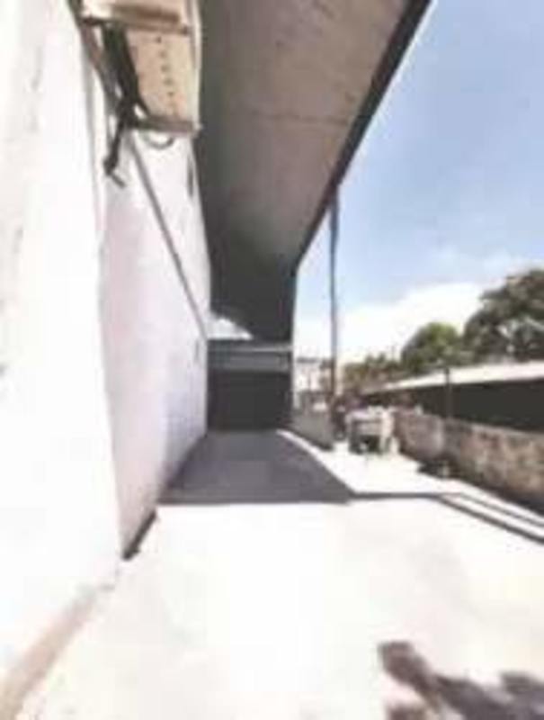 Exterior industrial loading dock with covered driveway and overhead metal roof Rio Abajo Panama City