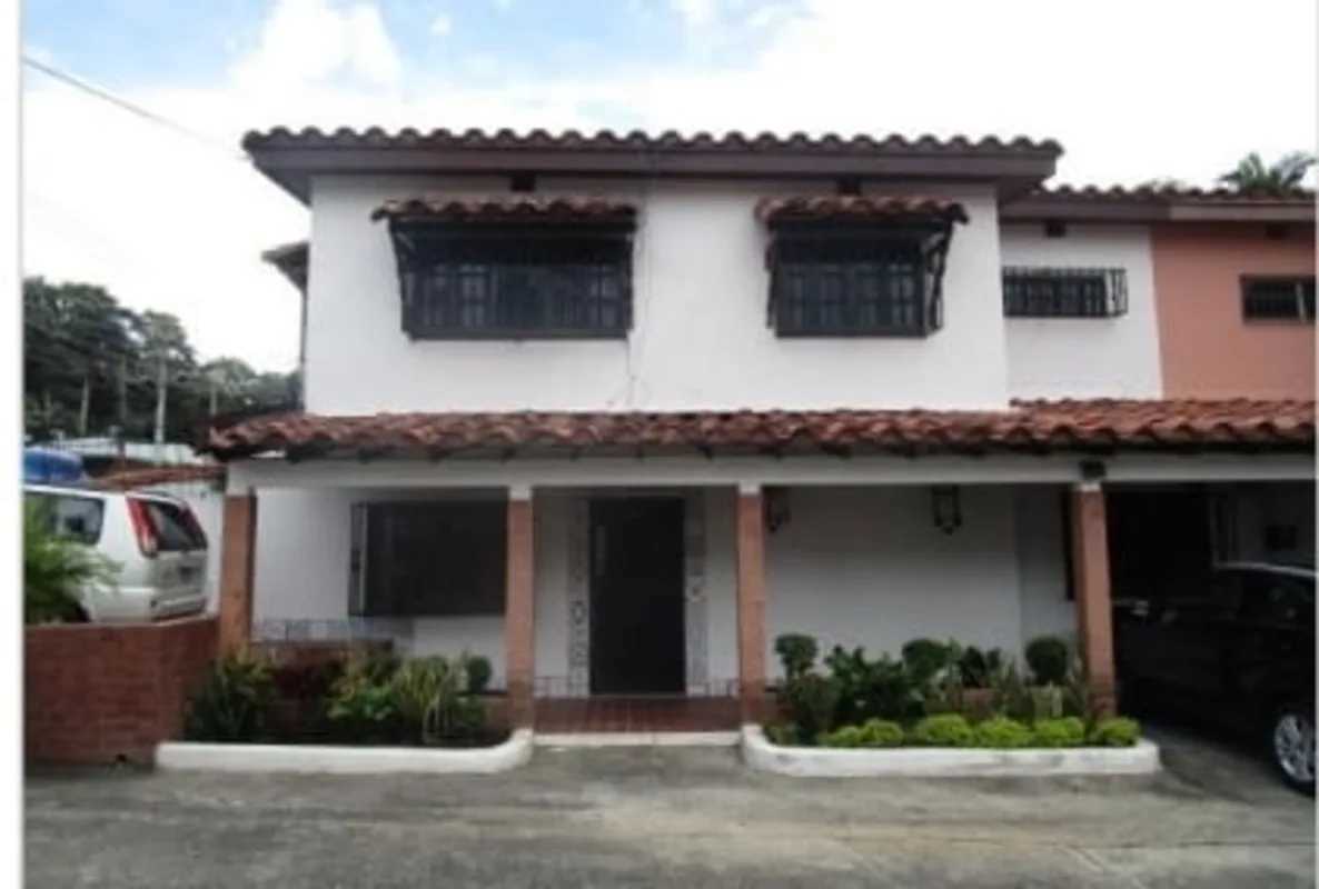 External view two-level house with terracotta roof, porch and landscaping San Francisco