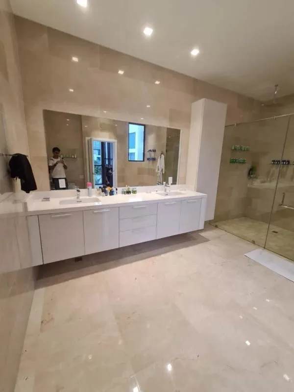 Spacious living room with marble floors, panoramic windows showing Pacific Ocean in PH Ocean Reef Punta Pacífica